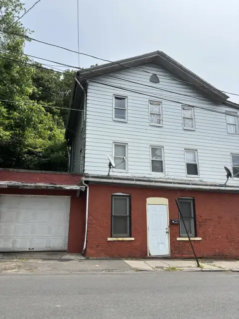 Waterbury Triplex with Occupied Units
