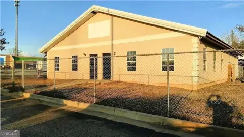 Commercial Land with Existing Buildings