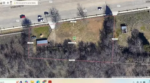 Vacant Acre Lot on Highway