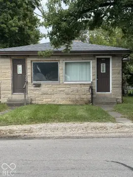 Two-Unit Duplex with Carport