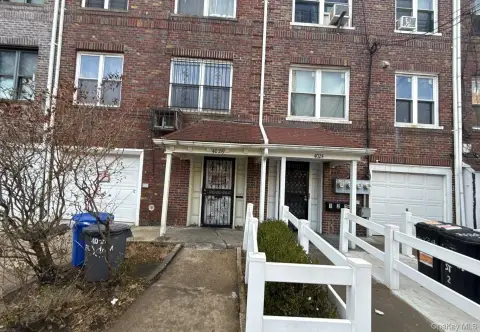 Elmhurst Three-Family Home with Garage