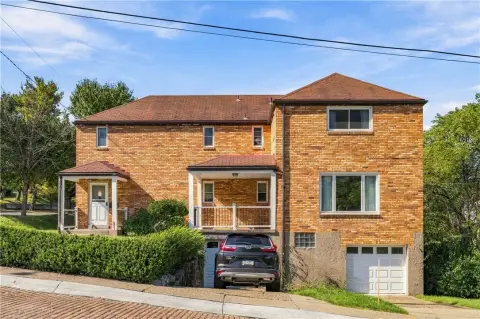 Brick Duplex with Garages