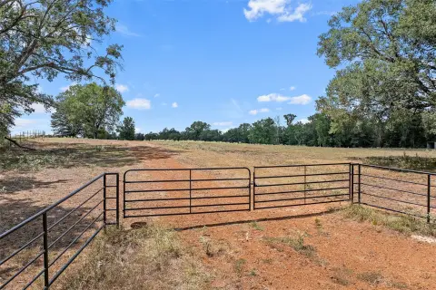 Fenced Agricultural Land with Pond