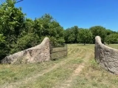 Land with Creek and Shop