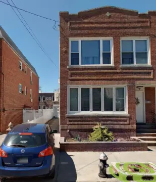 Two-Family Semi-Detached Brick Home