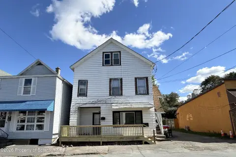 Triplex with Updated First-Floor Unit