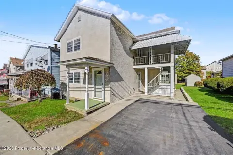 Duplex with Three-Car Garage