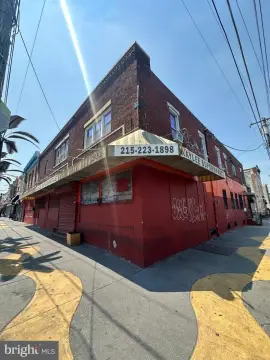 Mixed-Use Building with 5 Apartments