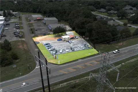 Car Lot on Snow Road