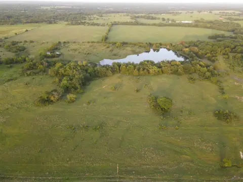 Wooded Agricultural Land with Pond