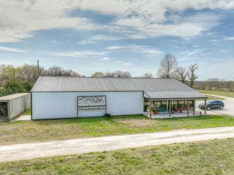 Highway Frontage Building on Acreage