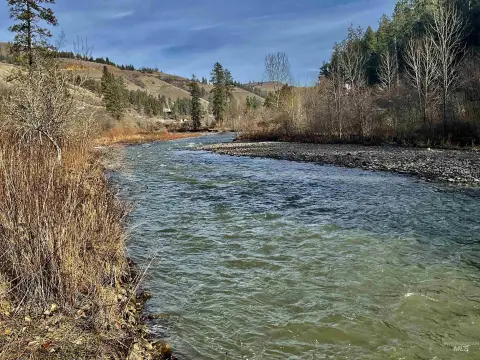 Acreage with River and Utilities