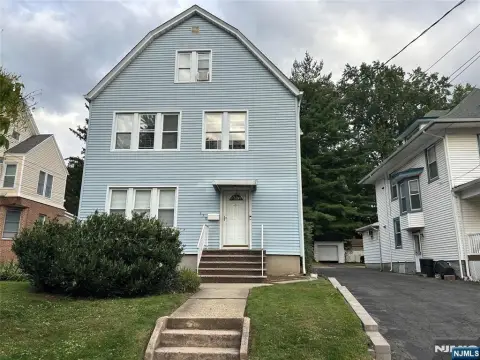 Two-Family Duplex with Two-Car Garage