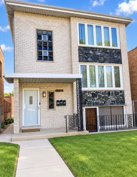 Brick Triplex with Detached Garage