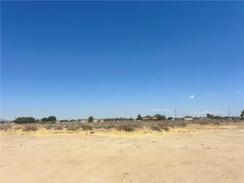 Vacant Land with Three-Sided Fencing