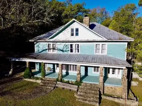 Riverfront Retreat with Historic Motel