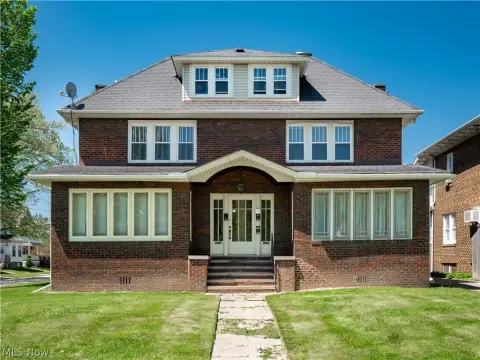 Brick Triplex with Four-Car Garage