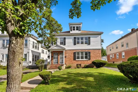 Duplex with Detached 3-Car Garage