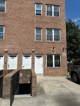 Brooklyn Legal Three-Family Brick Building