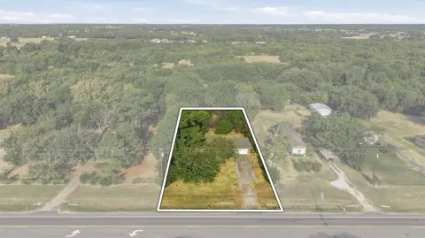 Commercial Land with Existing Home