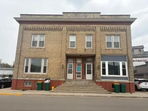 Side-by-Side Duplex with Tandem Garages