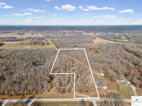 8 Acres with Shop Building