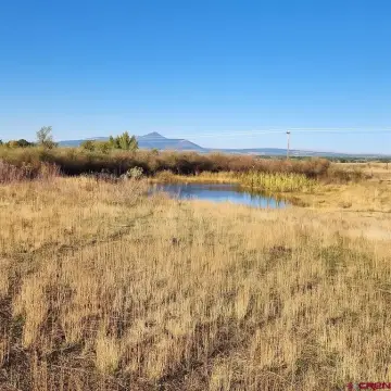 Land with Panoramic Mountain Views