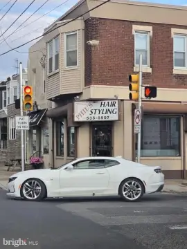 Turnkey Duplex with Retail Space