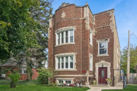 Brick Triplex with Detached Garage