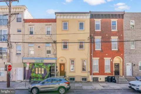Francisville Duplex with Strong Income