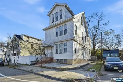 Spacious Income-Producing 2-Family Home