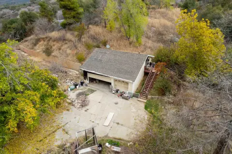 Land with Garage and Loft