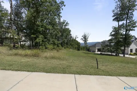 Land with Mountain Crest Views