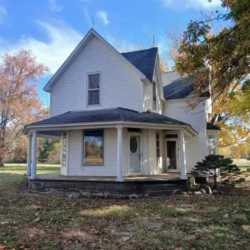 Updated Farmhouse with Acreage