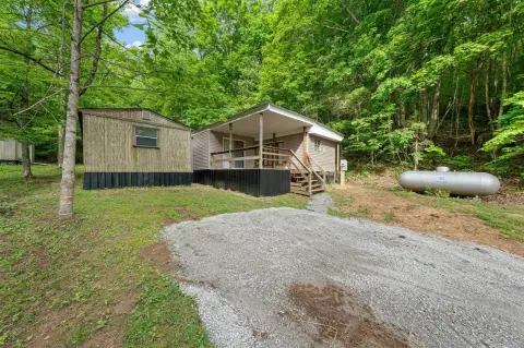 Secluded Acreage with Living Space