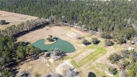 Land with Ponds and Oak Trees