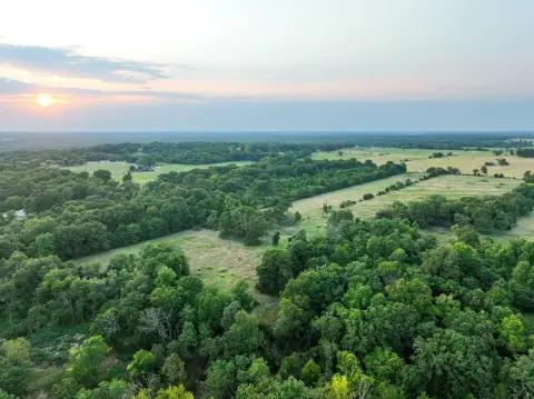 Fenced Farmland with Creek