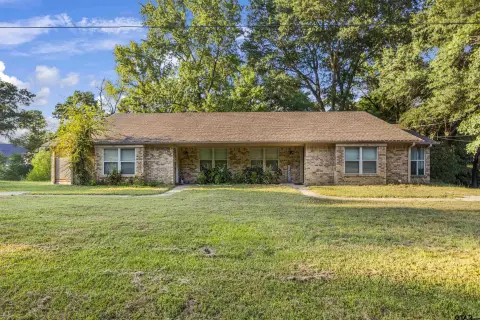 Occupied Duplex with Private Garages