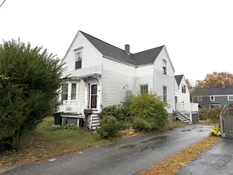 Two-Unit Duplex with Renovation Needs