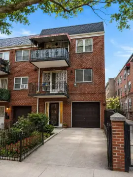 Brick Triplex with Private Driveway