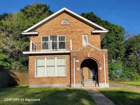 Charming Tudor-Style Duplex in Flint