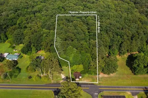 Acre Lot with Storage Building