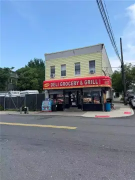 Mixed-Use Corner Property For Sale