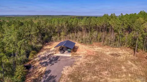 Milton Acreage with Concrete Pad