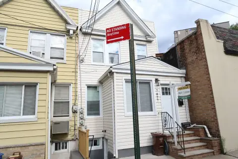Renovated 2-Family Home with Garage