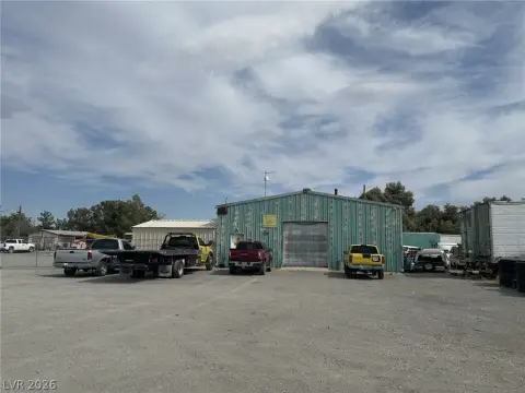 Fenced Commercial Land with Buildings