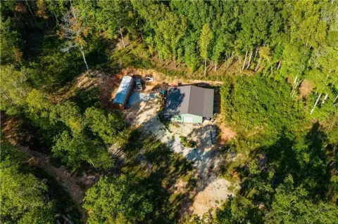 Wooded Acreage with Barn and Creeks