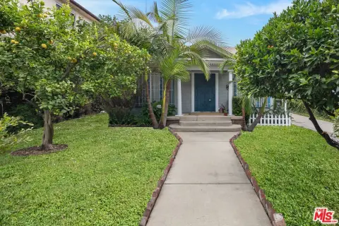 Renovated Triplex with Development Plans