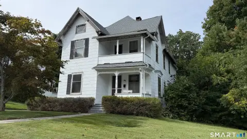 Duplex with Detached Three-Car Garage