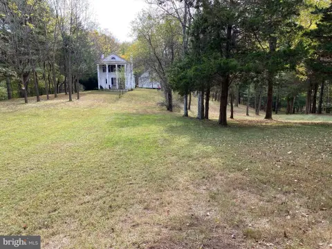 20-Acre Lot with Colonial Farmhouse